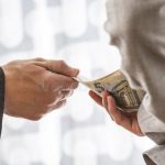 corruption-bribery-concept-businessman-politician-taking-bribe-female-colleague-handing-him-euro-money-behind-62111547